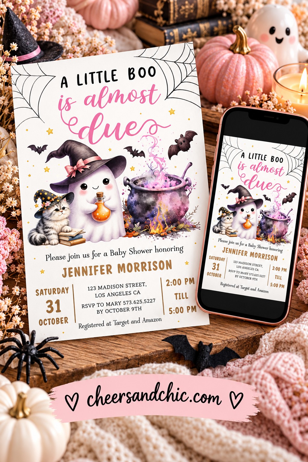 Little Boo invitation with pink script, a ghost, kitten, witch’s hat and purple cauldron